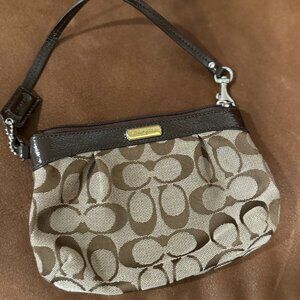 Coach patterned wristlet